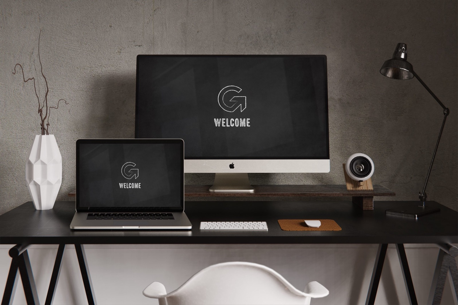 A Mac and an external monitor on a desk
